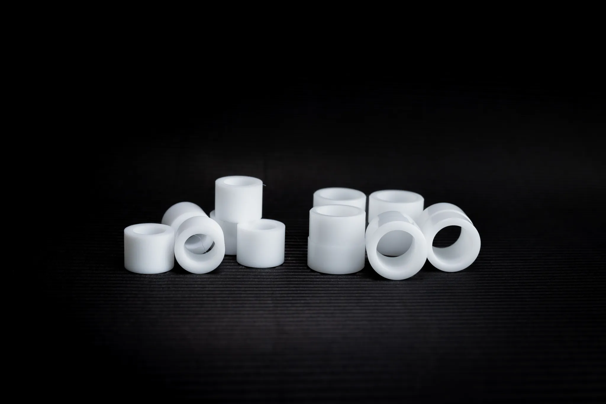 Plain bearings with PTFE